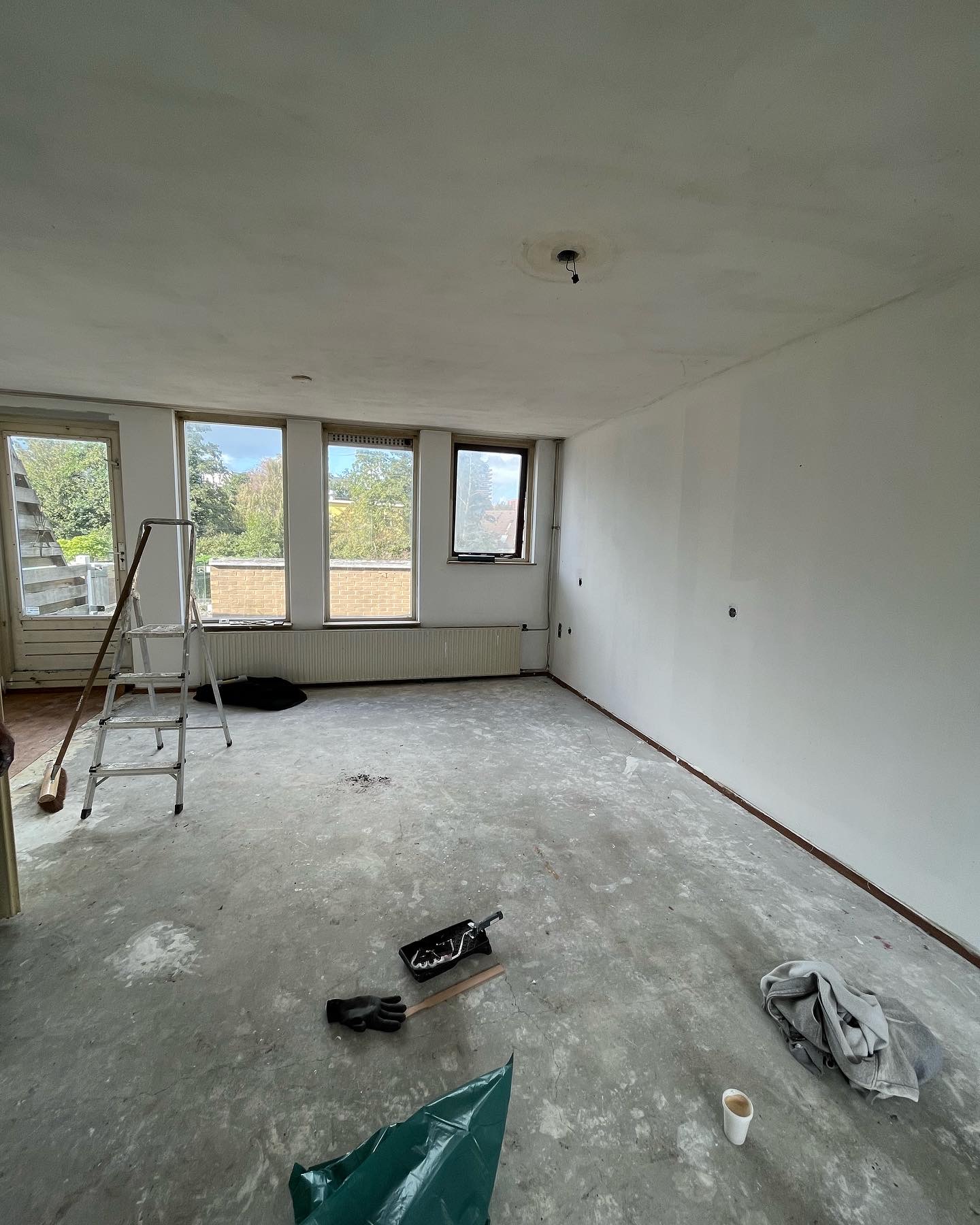 Woningontruiming Amsterdam - woonkamer na