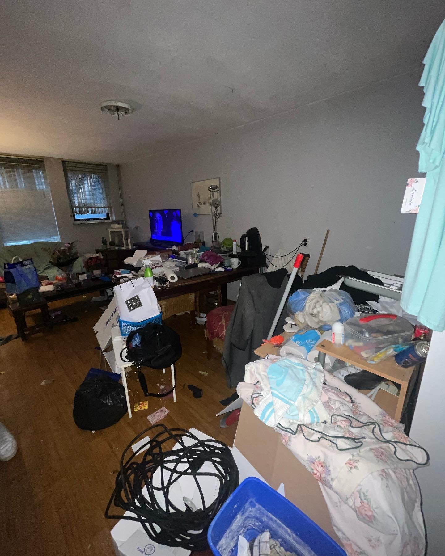 Woningontruiming Amsterdam - woonkamer voor